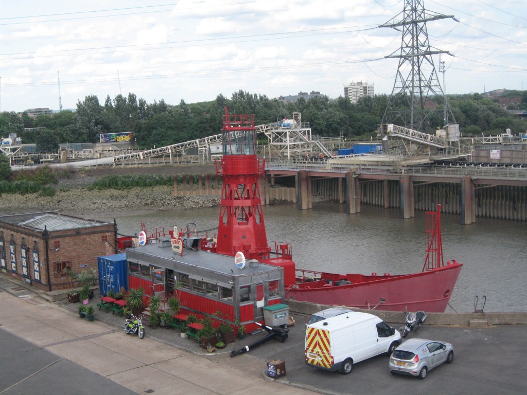 Another view of the lightship. The Fatboy Diner was conveniently closeby. In the background clay excavated from the Crossrail tunnel is moved down the Thames by barge to a wetlands area being built on the Essex marshes.